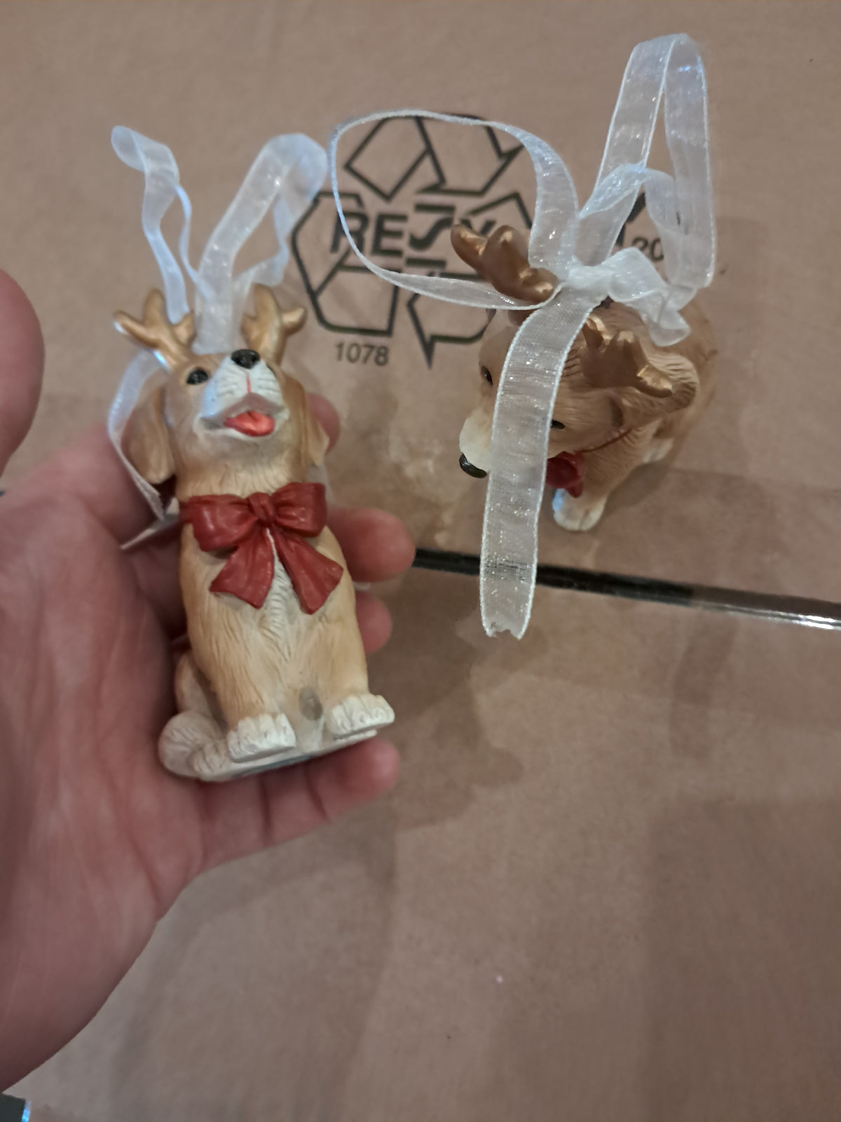 Set of two hanging john lewis dog ornaments