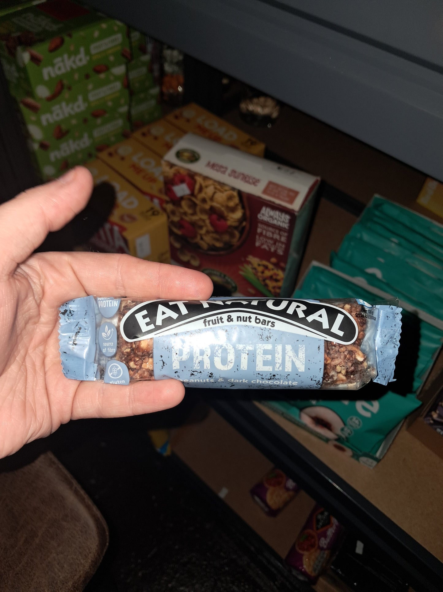 Eat natural peanuts and dark chocolate fruit and nut bar