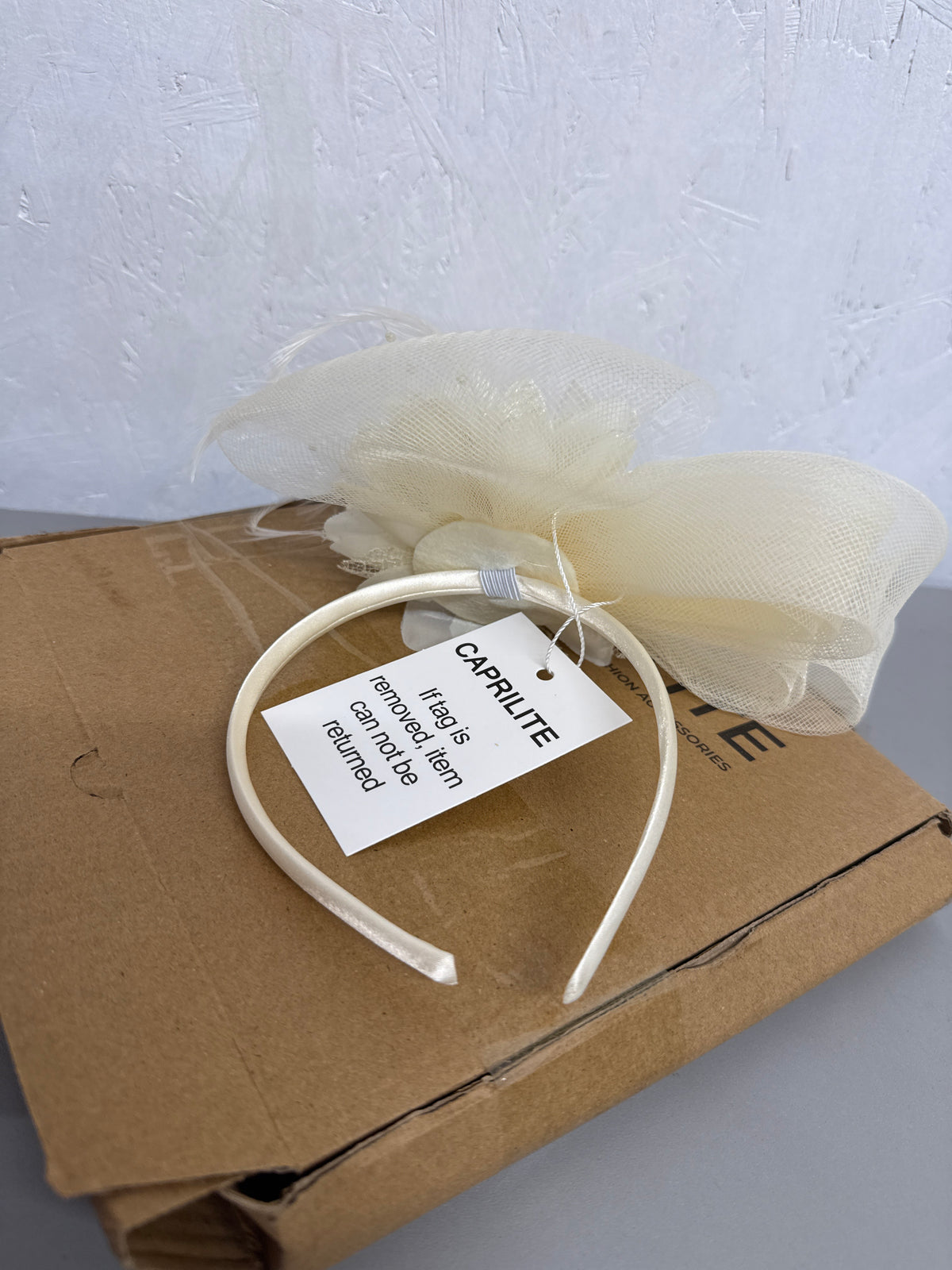 Caprilite - Cream/Ivory Fascinator