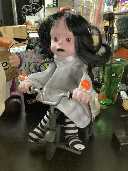 Terrifying tricycle girl