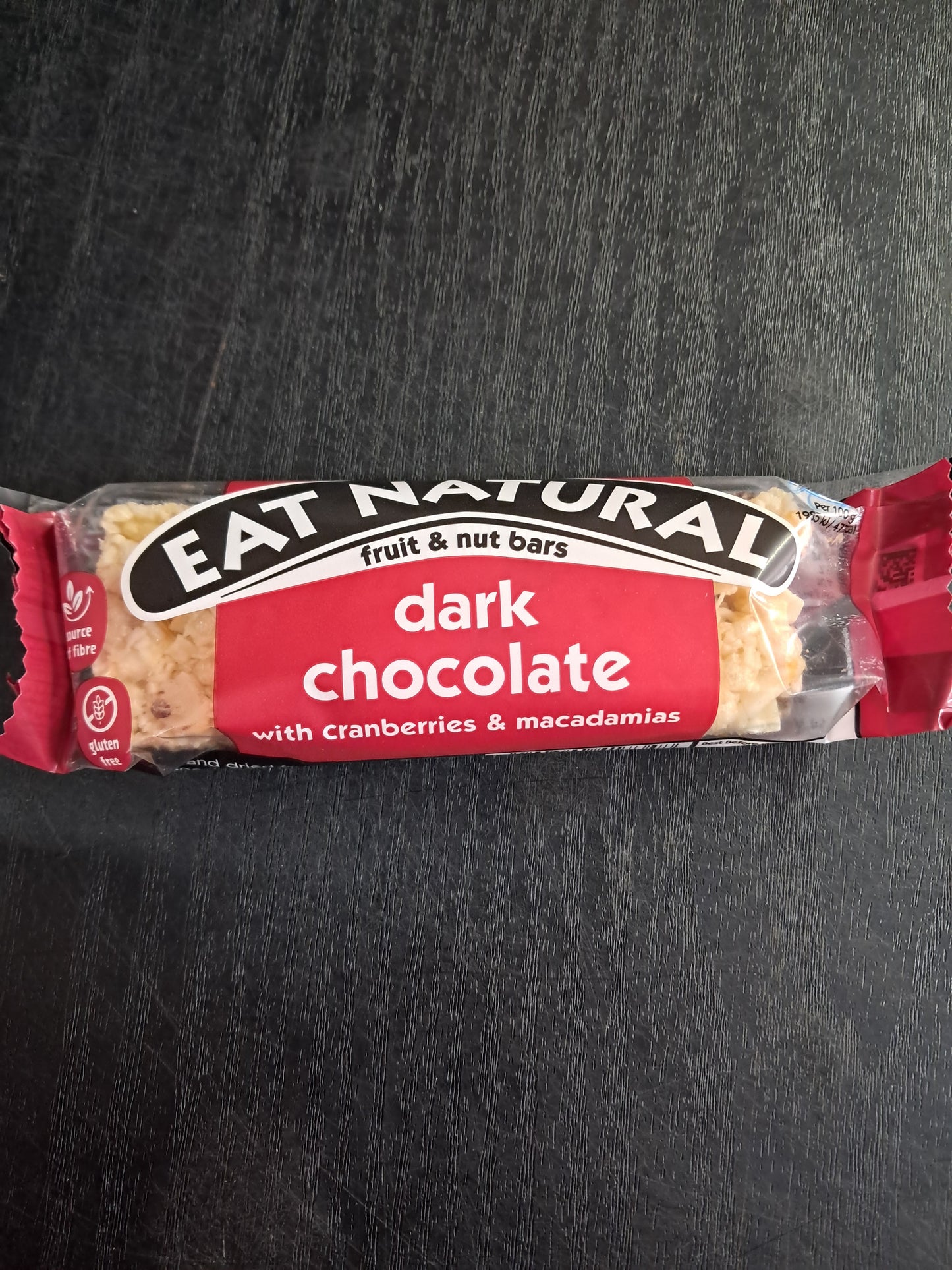 Eat natural dark chocolate with cranberries and macadamias