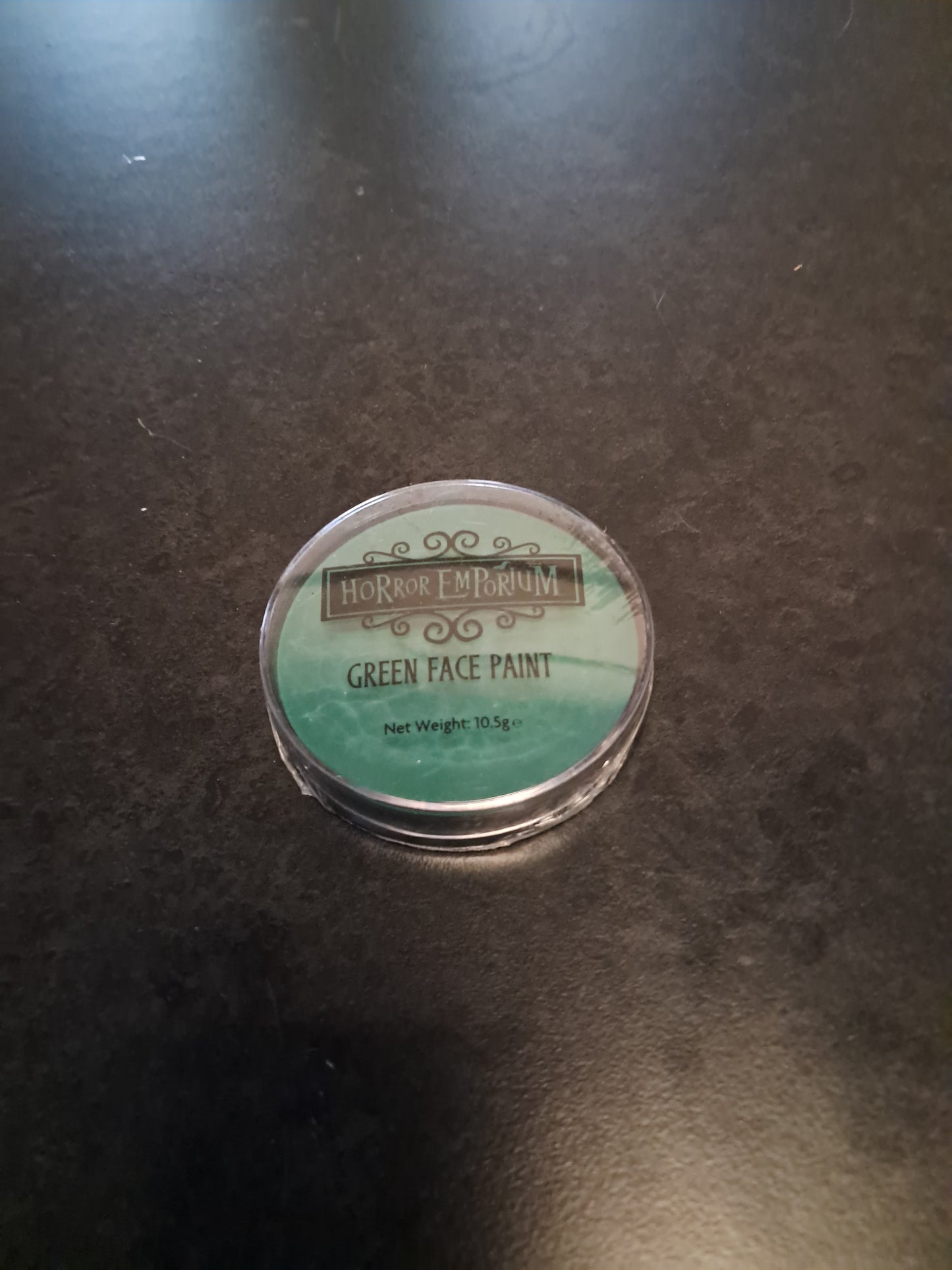 Green face paint