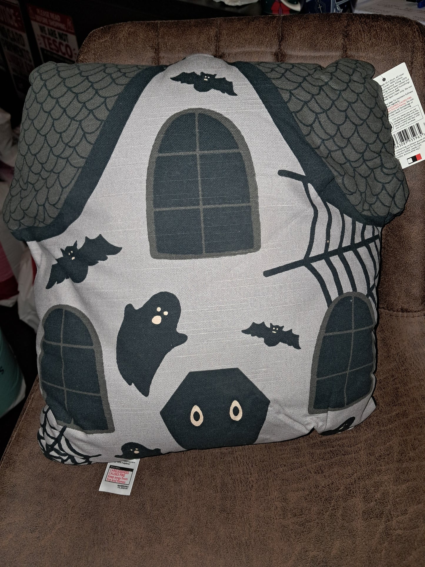 Spooky haunted house cushion